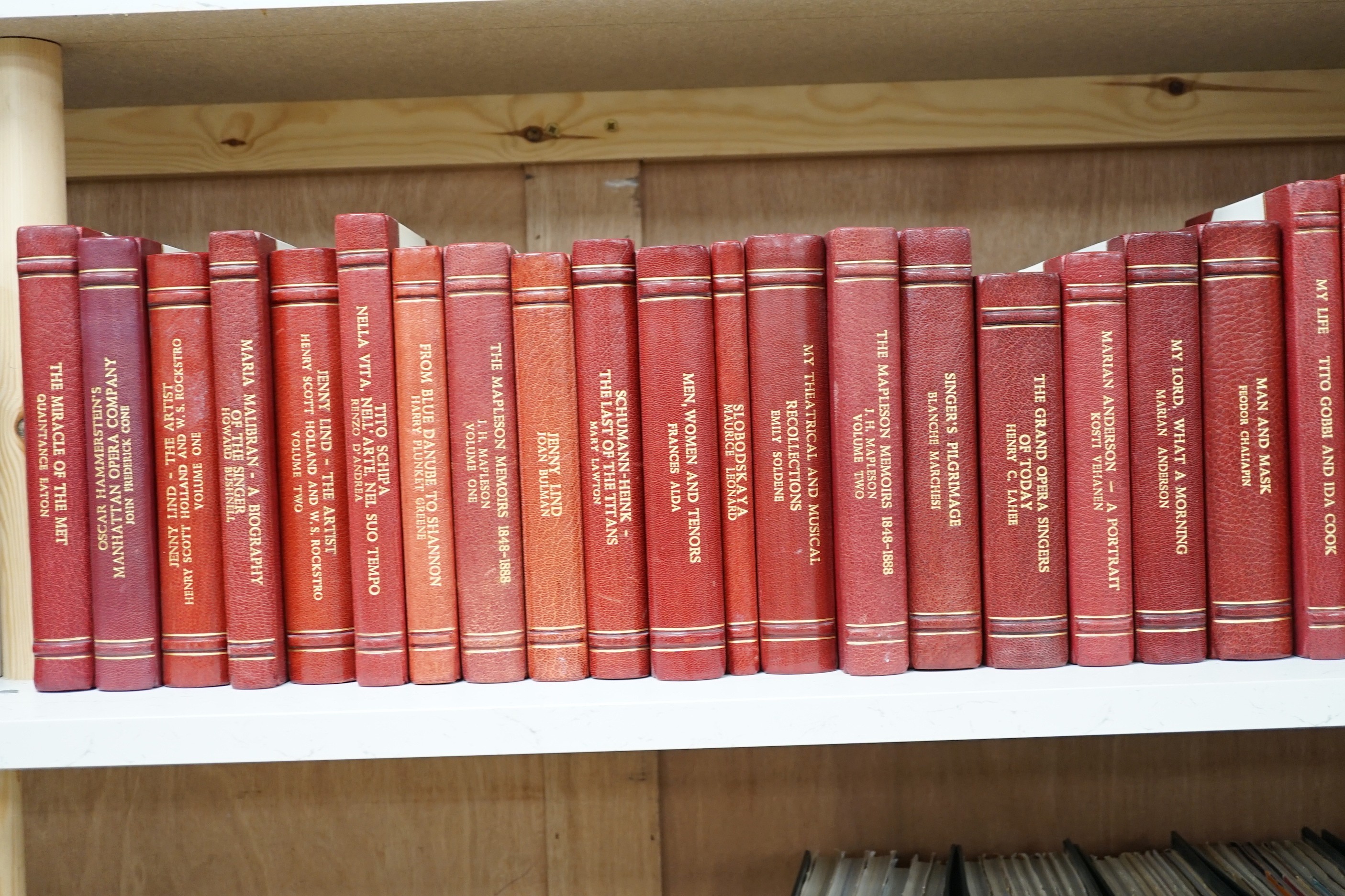 A collection of 19th and 20th century works on opera related biographies, autobiographies and histories, bound in red morocco by EA Weeks, London, one signed by the author, approx. 69 in total. Please note :- A SIMILAR L